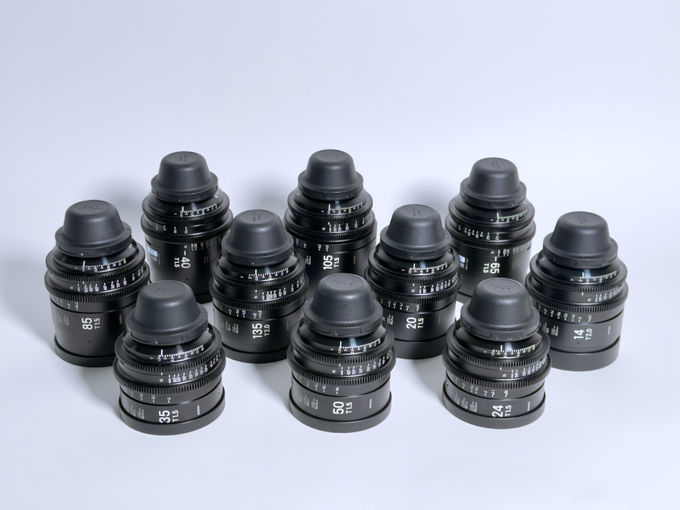 Ten Sigma Cine FF High Speed Prime lenses arranged with caps fitted