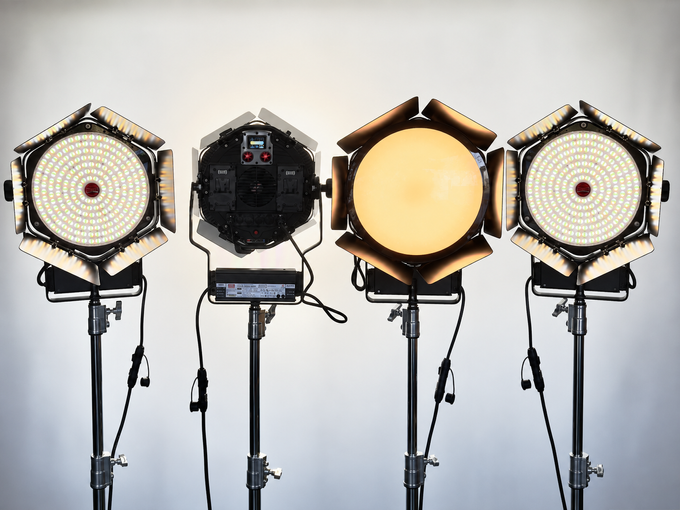 Illustrative composite of four Rotolight Anova Pro 3 light heads on stands