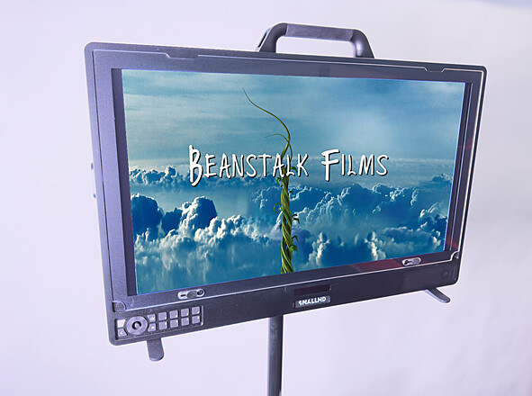 SmallHD Quantum 27 monitor on stand showing Beanstalk Films image