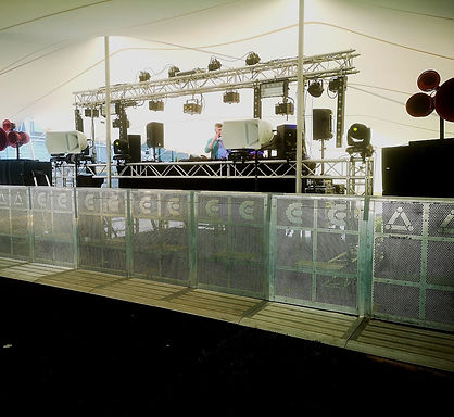 Stretch tent installation on event site in Ireland showing layout and ground setup