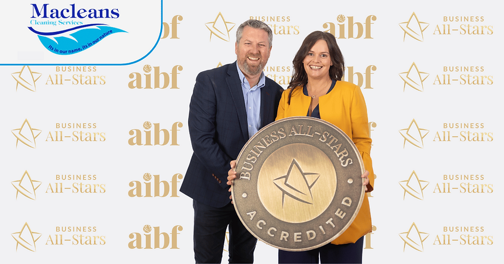 Emma and Neil with award