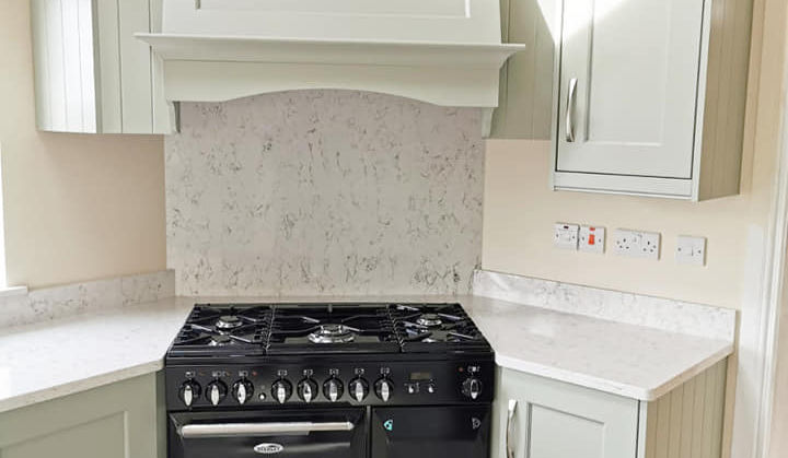 Black range cooker in modern kitchen