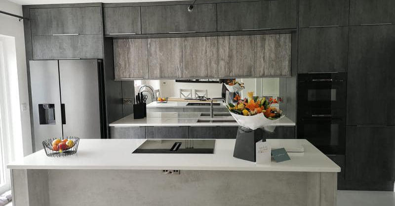 Modern gray kitchen with island and appliances