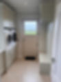 Elphin Fitted Furniture: Utility room with washer, dryer, and bench