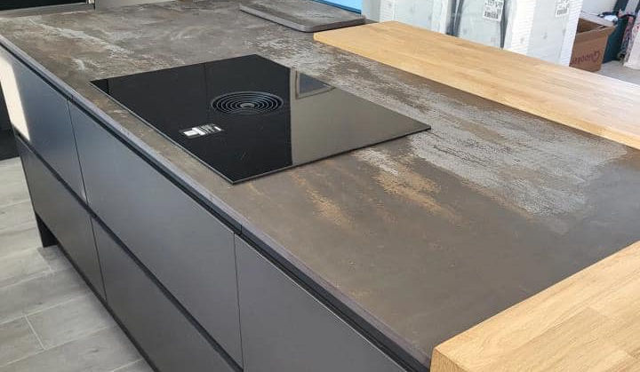 Modern kitchen island with sleek countertop and integrated hob