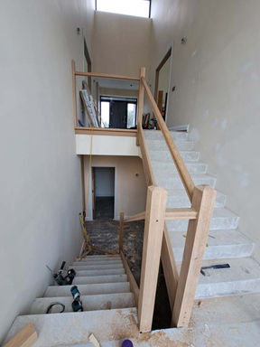 Oak staircase installation in progress