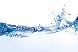 Dynamic blue water wave with splashing droplets