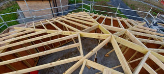Complex roof truss construction during house building