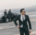 handsome-bodyguard-with-security-earpiece-and-gun-TUDPJ82_edited.jpg