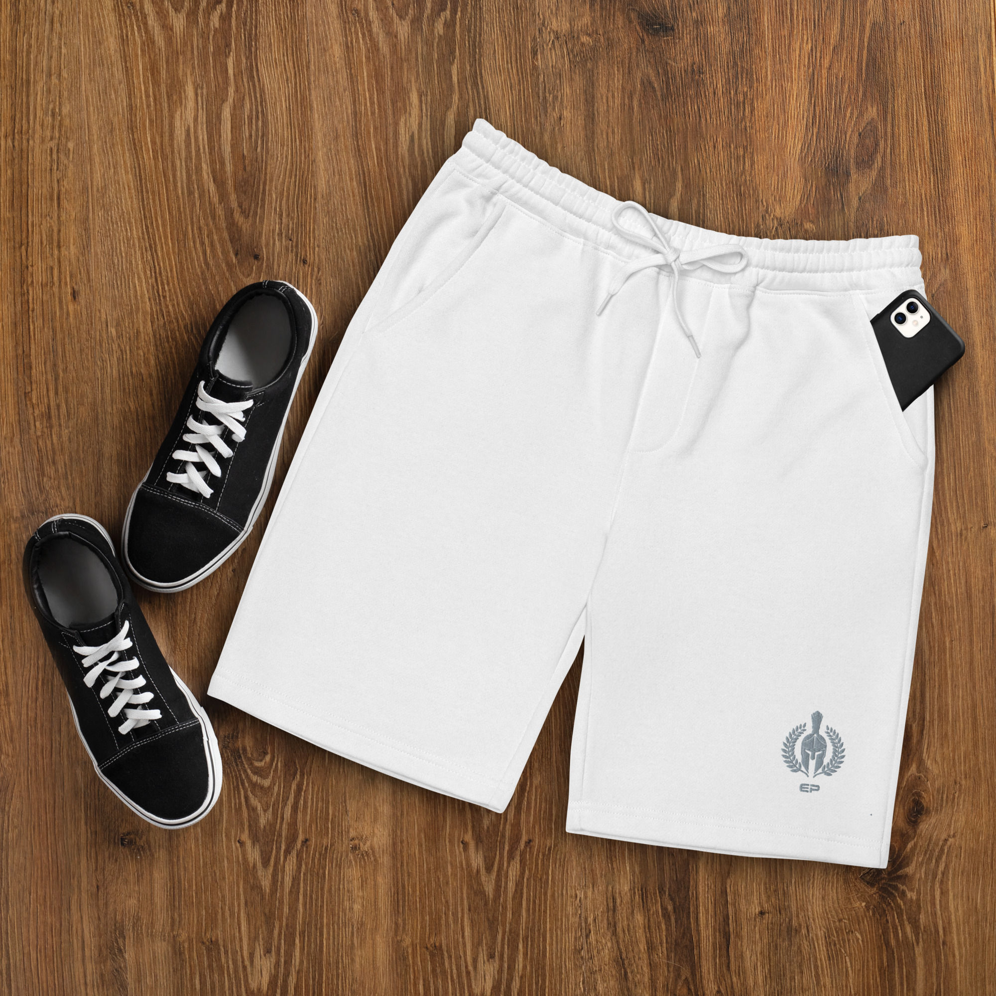 Men's white logo fleece shorts and sneakers