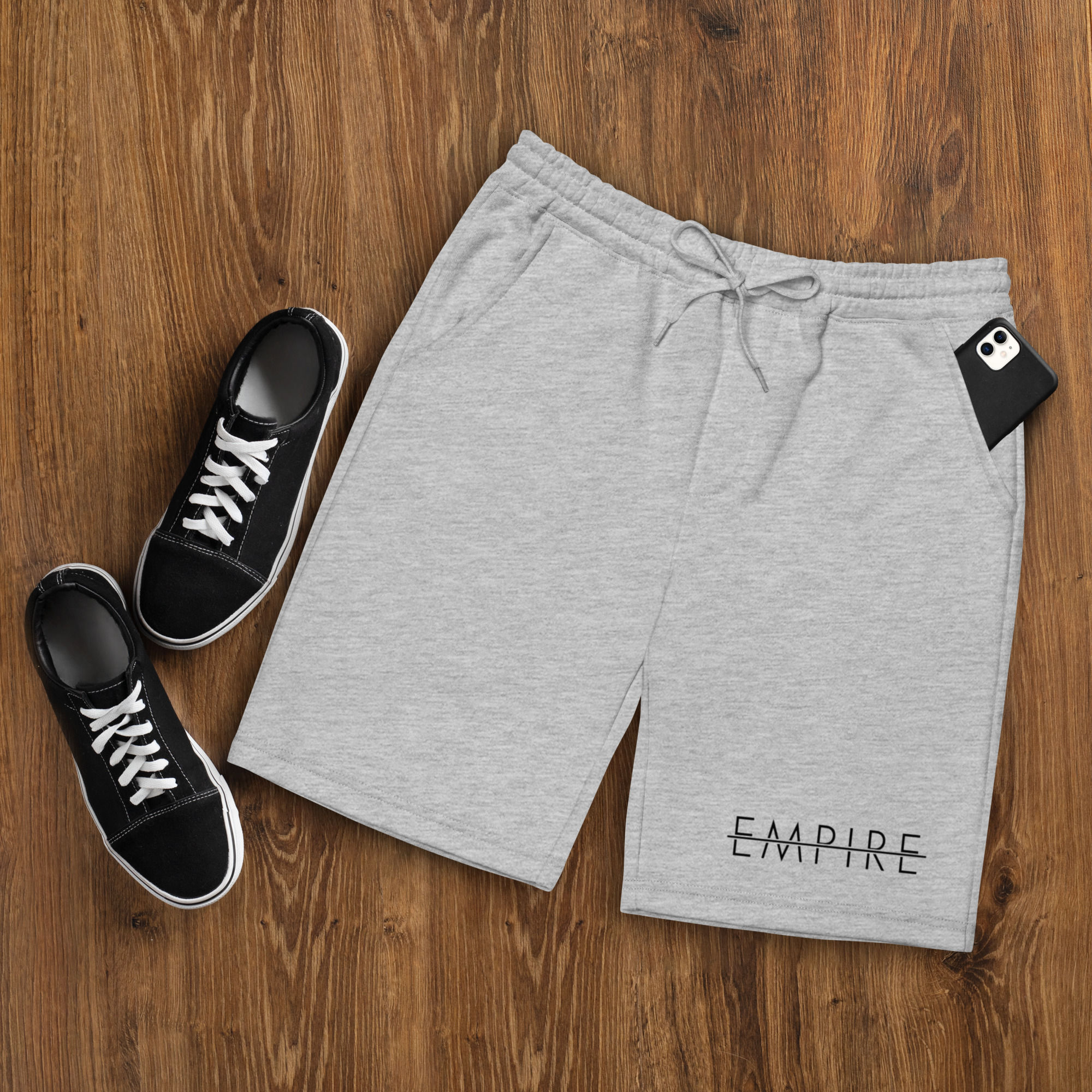 Grey Empire shorts with black sneakers