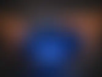 Person holding a PlayStation 4 controller