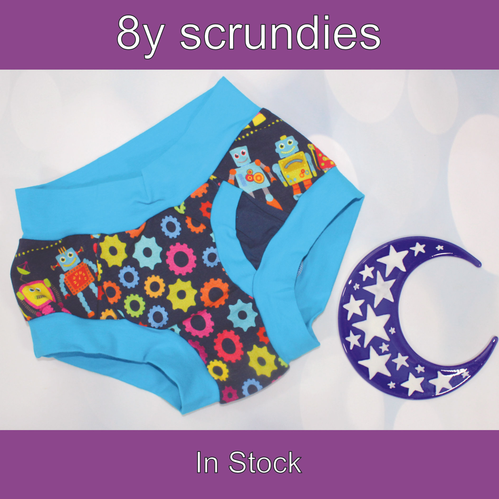 8y Child fly scrundies. Colourful robots and cogs prints with soft blue bands