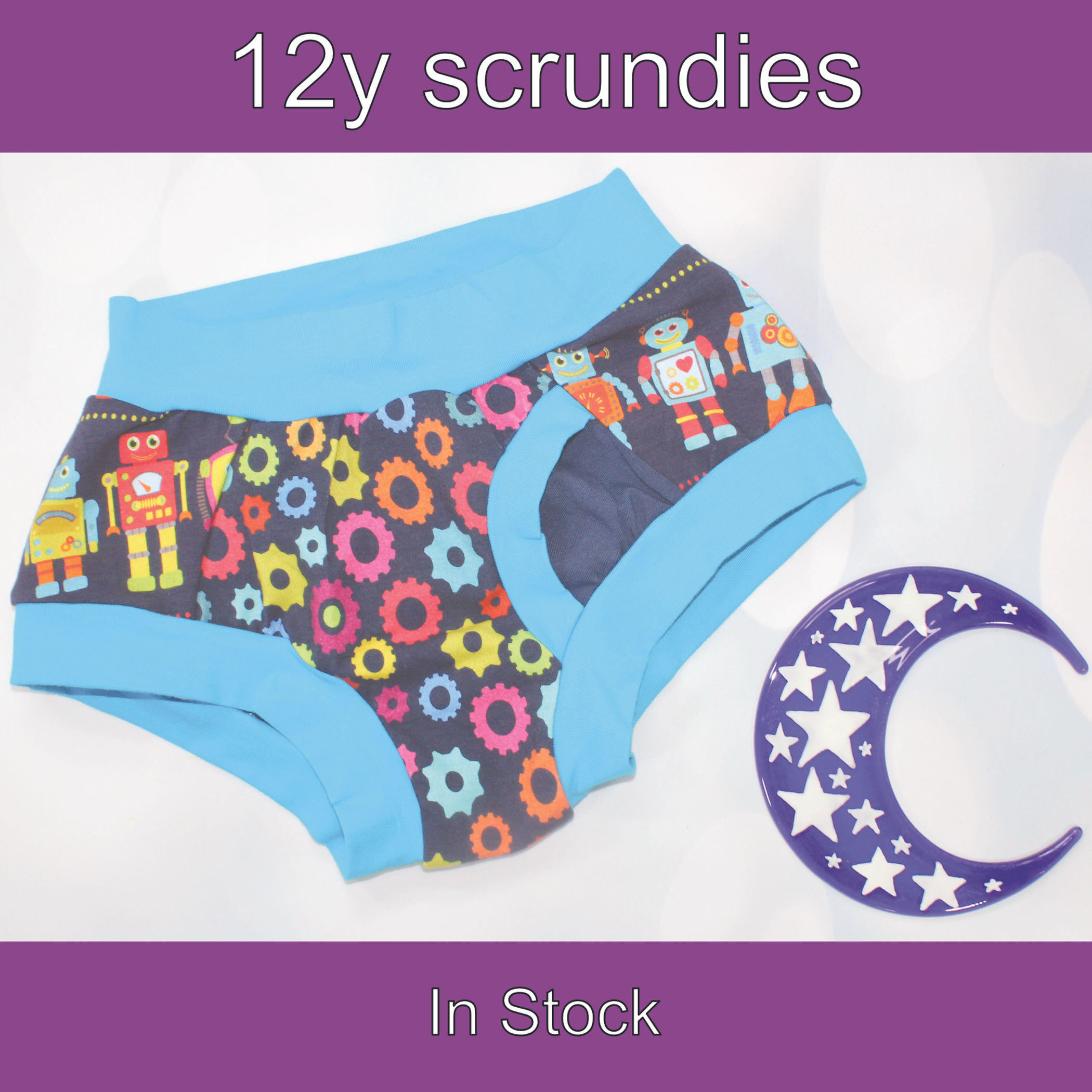 12y Child fly scrundies. Colourful robots and cogs prints with soft blue