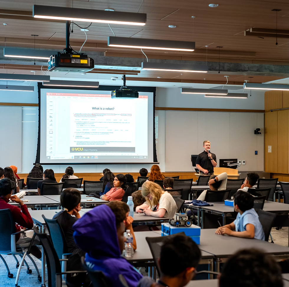 PhD mentor leading a STEM workshop session for RITS summer camp students at VCU Engineering