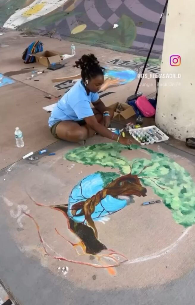 Arist Myiah Moody Huff has been a regular chalk artist at the annual Tampa Bay Chalk Festival on the Deuces, now in its fourth year. Image courtesy of Pinellas Diaspora Arts Project and Tampa Bay Chalk Festival.