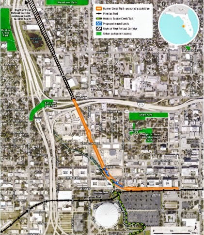 A map showing the existing Booker Creek Trail (bottom), the extension (orange), the Pinellas Trail (solid black), and a potential expansion (top). Image: City documents.