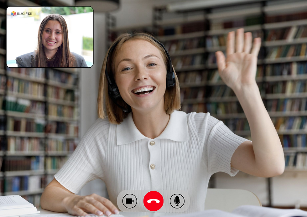 A woman on a video call waving, with another person visible in a smaller inset window.
