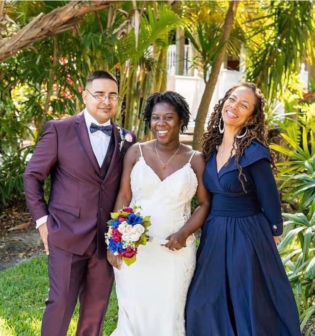 Dr. Scully officiating wedding of two students. Photo courtesy of Judith Scully.