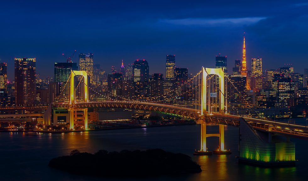 Tokyo skyline at night with Rainbow Bridge and Tokyo Tower