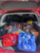 Photo by Meco Sparks: Car filled with donations. 