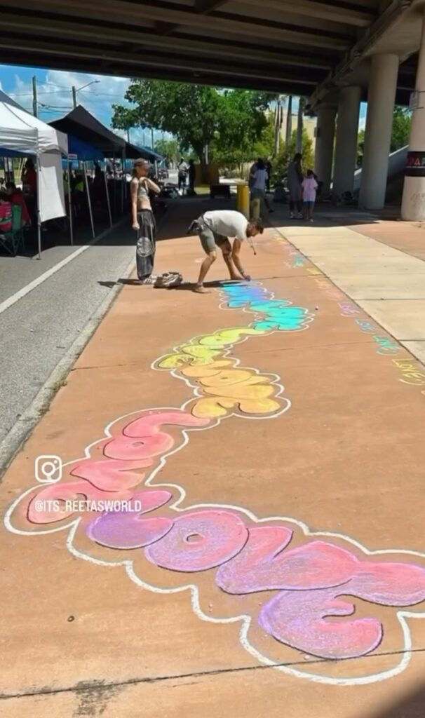 Artists at the 2nd annual Tampa Bay Chalk Festival; image courtesy of Pinellas Diaspora Arts Project.