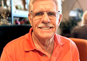 Me in orange shirt for blog portrait_edited_edited.jpg