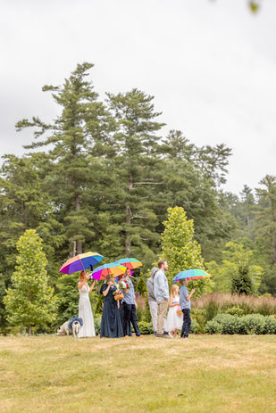 rainy group with rainbow umbrellas