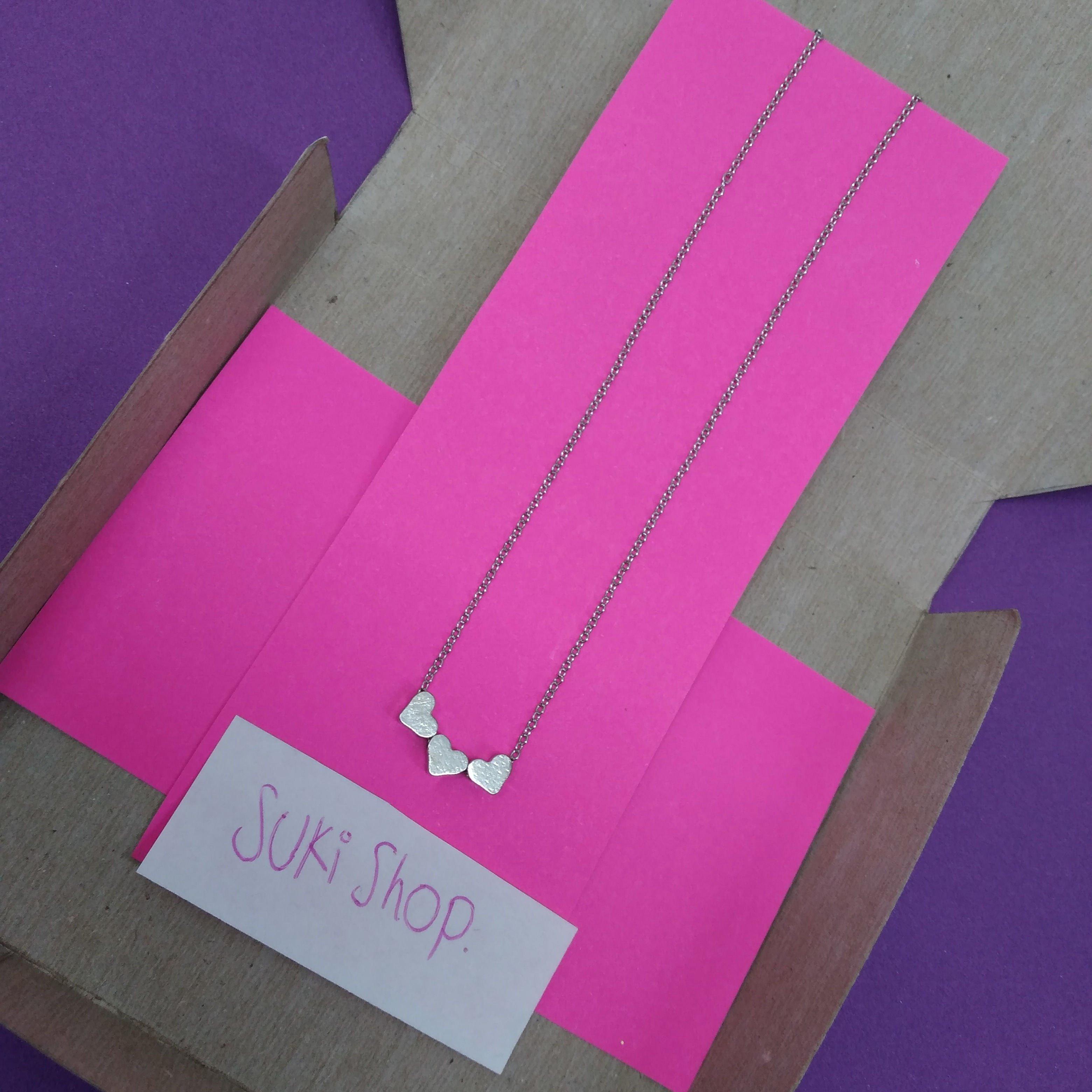 Collar tres corazones