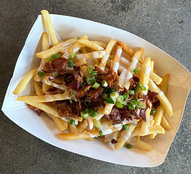 Cheesy fries with melted cheese and bacon from JP’s Grill late night menu in Durham, NH