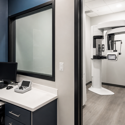 Dental cone-beam CT imaging room with operator control area