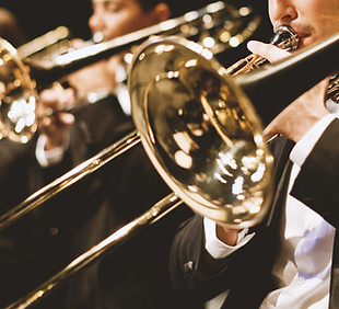 Trumpet players in orchestra