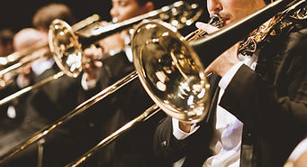Trumpet players in orchestra
