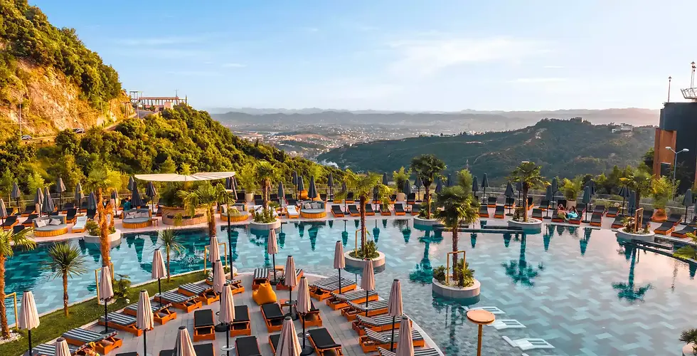 Infinity pool area at Select Hill Resort overlooking the Tirana countryside.