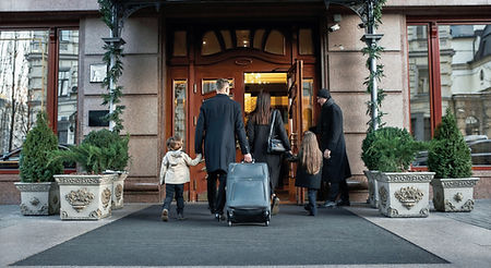Business delegates and corporate executives checking in at a luxury business hotel and conference venue managed by Albania Co