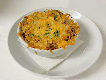 Pulled pork mac and cheese at Branches Grill and Café, a Caribbean-inspired restaurant in Chatham, MA, serving comfort food on Cape Cod.