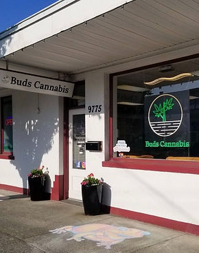 Exterior of Buds Cannabis store in Sidney, British Columbia, with 'Buds Cannabis' sign, '9775' storefront.