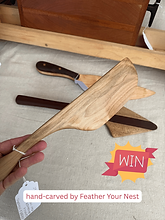 hand-carved by Feather Your Nest (1).png