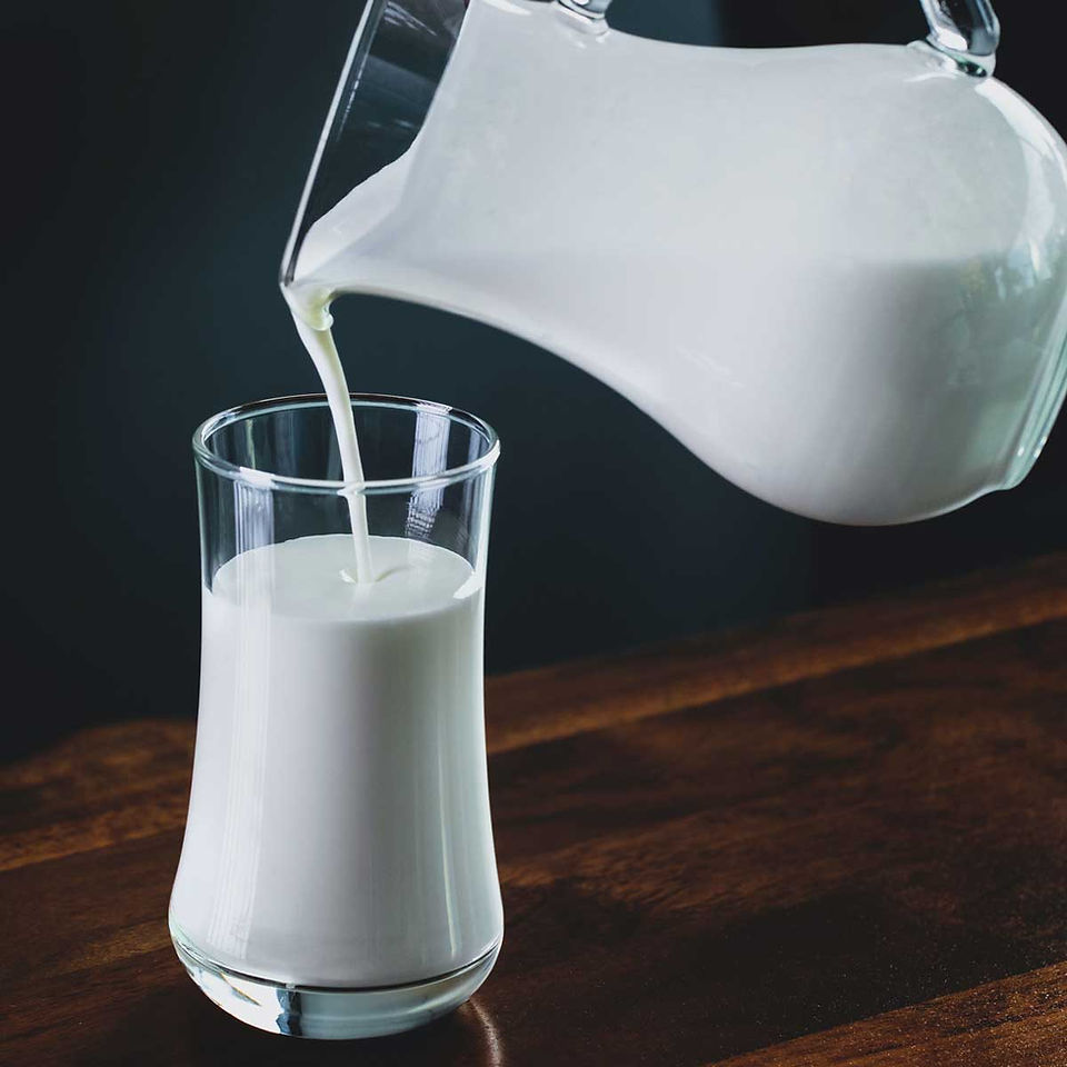 pouring milk into glass
