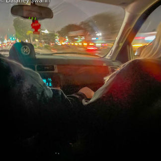 I captured this image of my parents holding hands while on a drive.