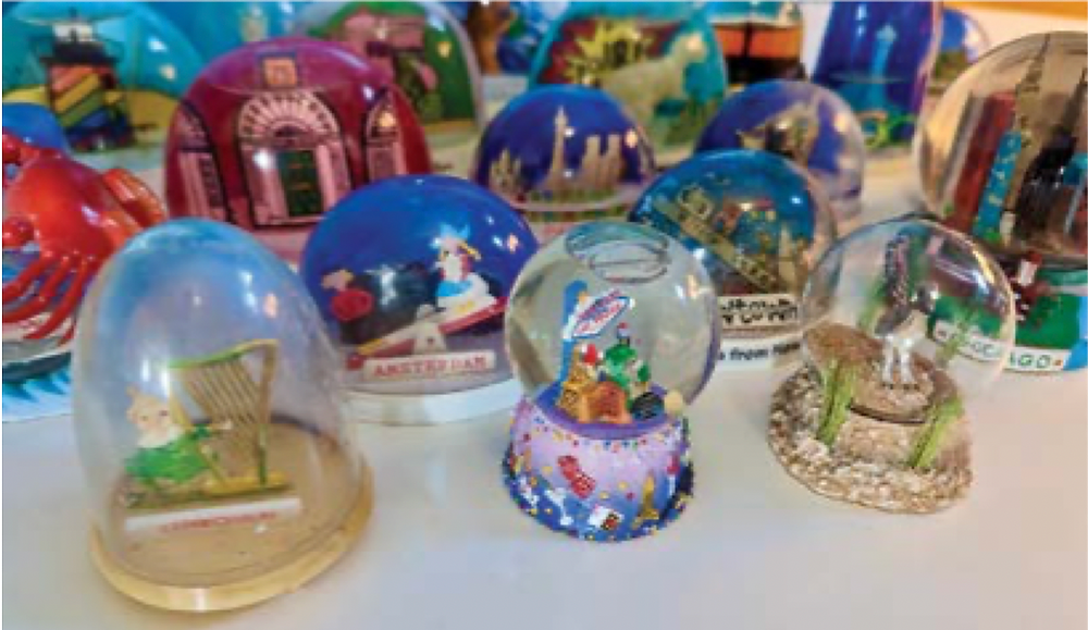 A Playful Distillation of Place: The Colourful History of Snow Globes