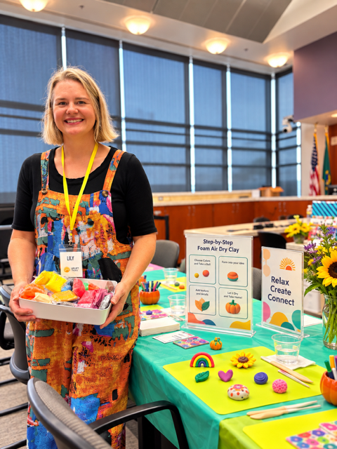 Lilian preparing for a company wellness fair- Hooray its Clay Day!