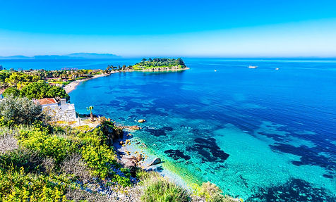 perfect-day-at-cococay-icon-arrival-turquoise-ocean-aerial-overwater-cabanas.webp