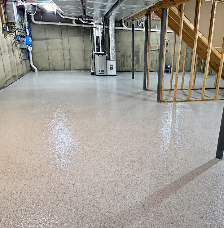 Finished basement with new Epoxy floor with stairs and structural support Sealed Concrete & Epoxy