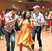 een dance students practicing Latin choreography in studio