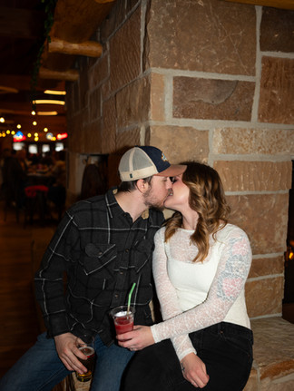 Indoor flash engagement photos at a brewery, the Leinie Lodge in Chippewa Falls, WI