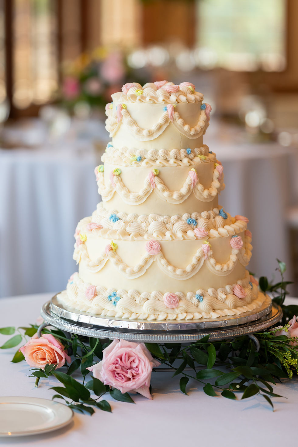 Classic vintage style wedding cake by The Butterstick in Hot Springs, AR