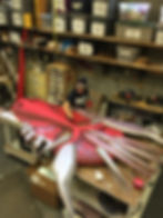 Painting one of the 5 heads.