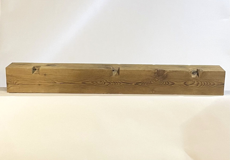 Weathered Antique mantel made from reclaimed wood.