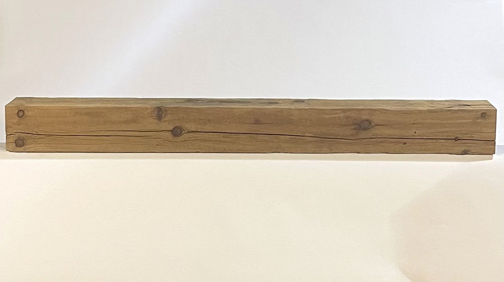 Weathered Antique mantel made from reclaimed wood.